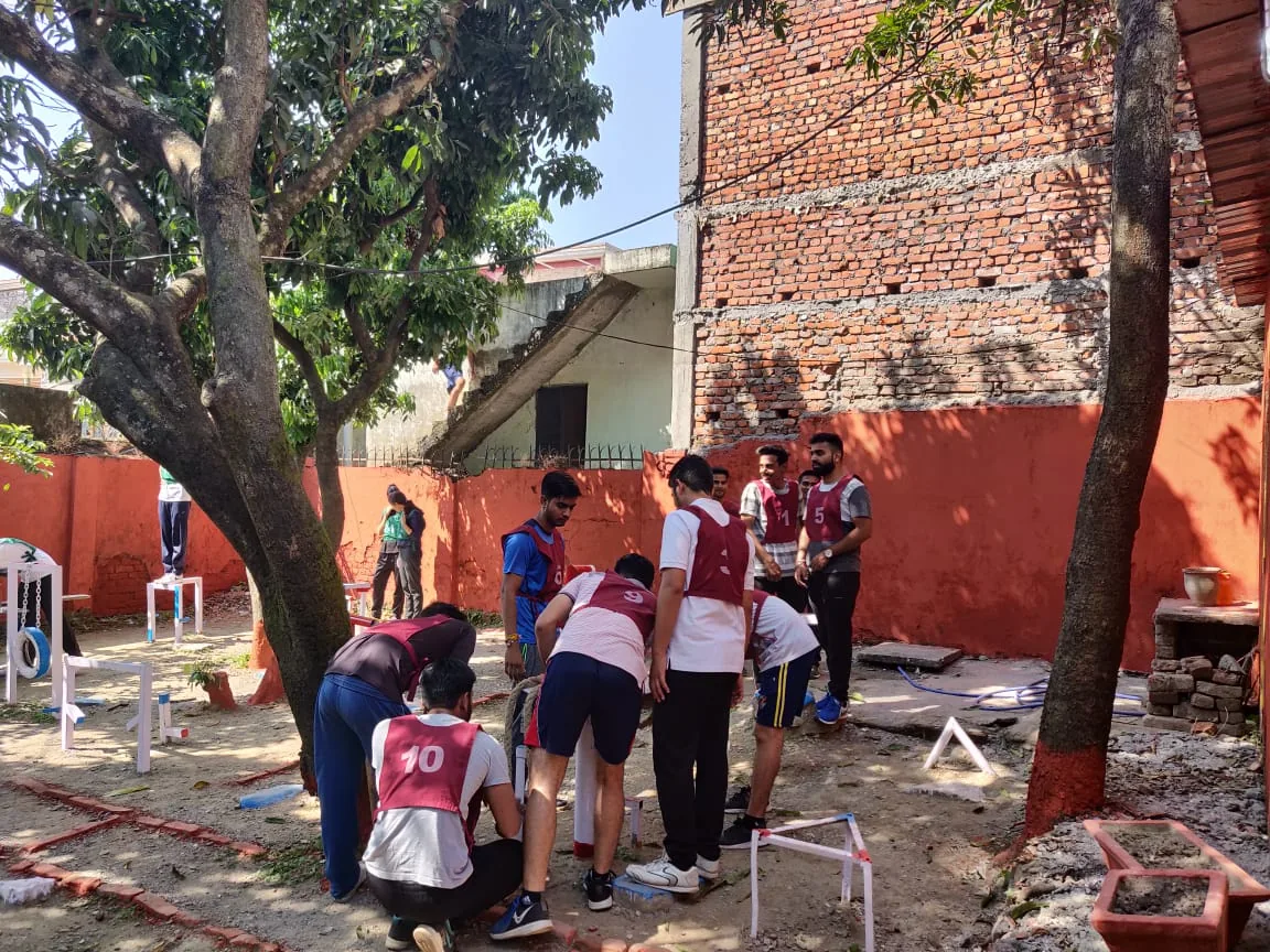 Students working together on an outdoor group task