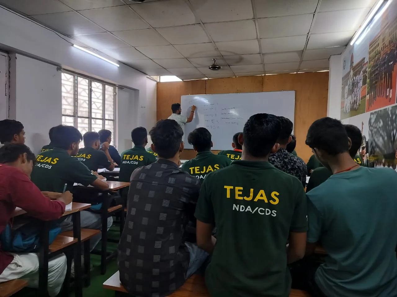 Students taking notes during a lesson